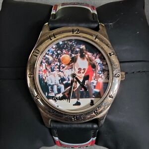 Gold Watch with Basketball Player Design